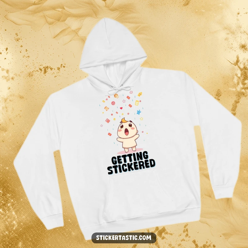 Funny hoodie showing a surprised character looking up at a rain of stickers, perfect for cozy, humorous wear.